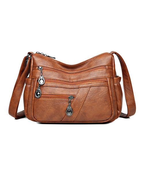Sac bandoulière en cuir souple avec multipoches